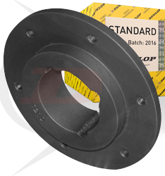 A black rubber automotive part with a circular design is positioned in front of a yellow box labeled