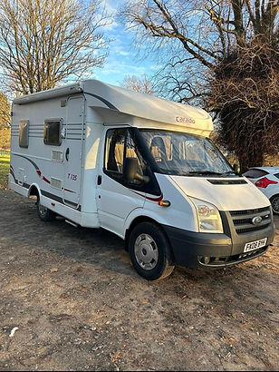 White camper van parked outdoors