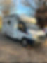 White camper van parked outdoors