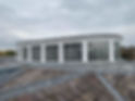Curved rooftop with large square windows