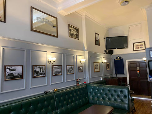 Cozy pub interior with architrave design.