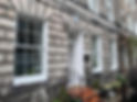 Townhouse exterior with symmetrical sash windows