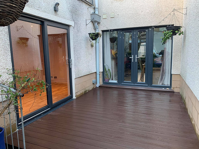 Modern patio deck with dark wood flooring