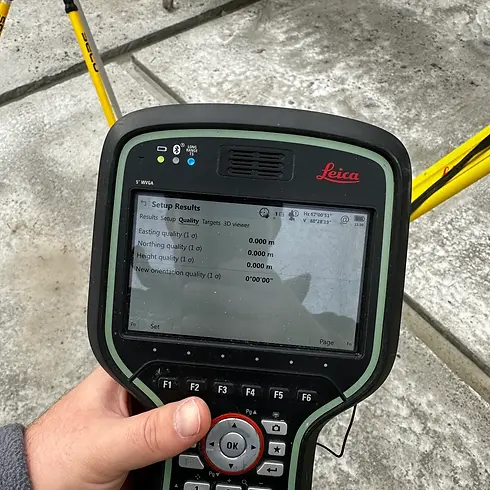 Handheld inspection camera monitor with a digital screen being used by a technician outdoors