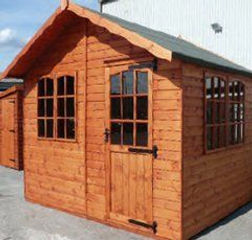 Wooden garden shed with a pitched roof, featuring two front windows and a door with glass panels