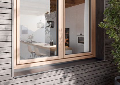 Modern window set into exterior timber cladding showing interior kitchen view