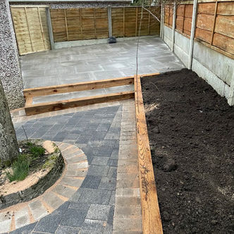 Raised garden landscaping with block paved steps