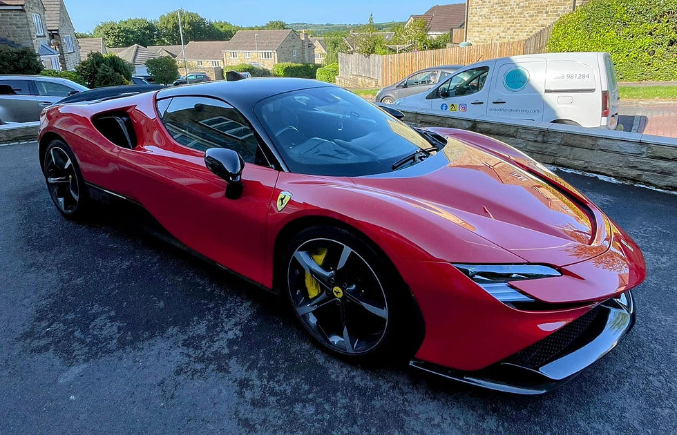 freshly washed red sports car
