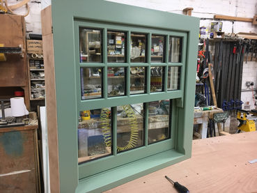 Green window in workshop setting