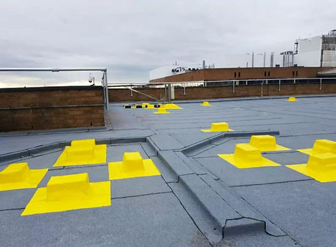 Yellow markers on roofing surface