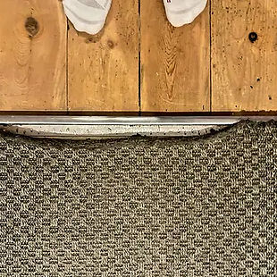 Carpet worn in doorway