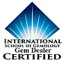 Badge with a blue crest reading International School of Gemology Gem Dealer Certified