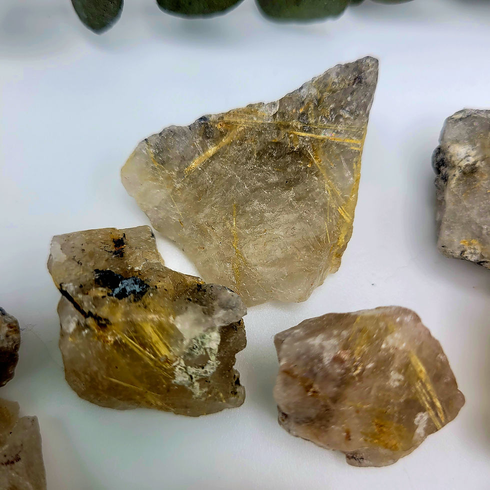 Thumbnail: Close up of Golden Rutilated  Quartz Raw Crystals. 0.75 to 1.5 inches