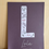 Thumbnail: Letterposter L, Lola. Witte lijn in het midden