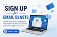 Laptop with envelopes flying out of it.