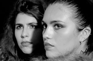 BEHIND THE BEADED CURTAIN