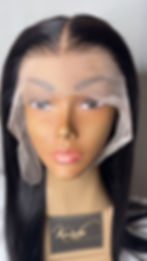 Long 28-inch human hair frontal wig featuring silky straight texture and glueless fit.