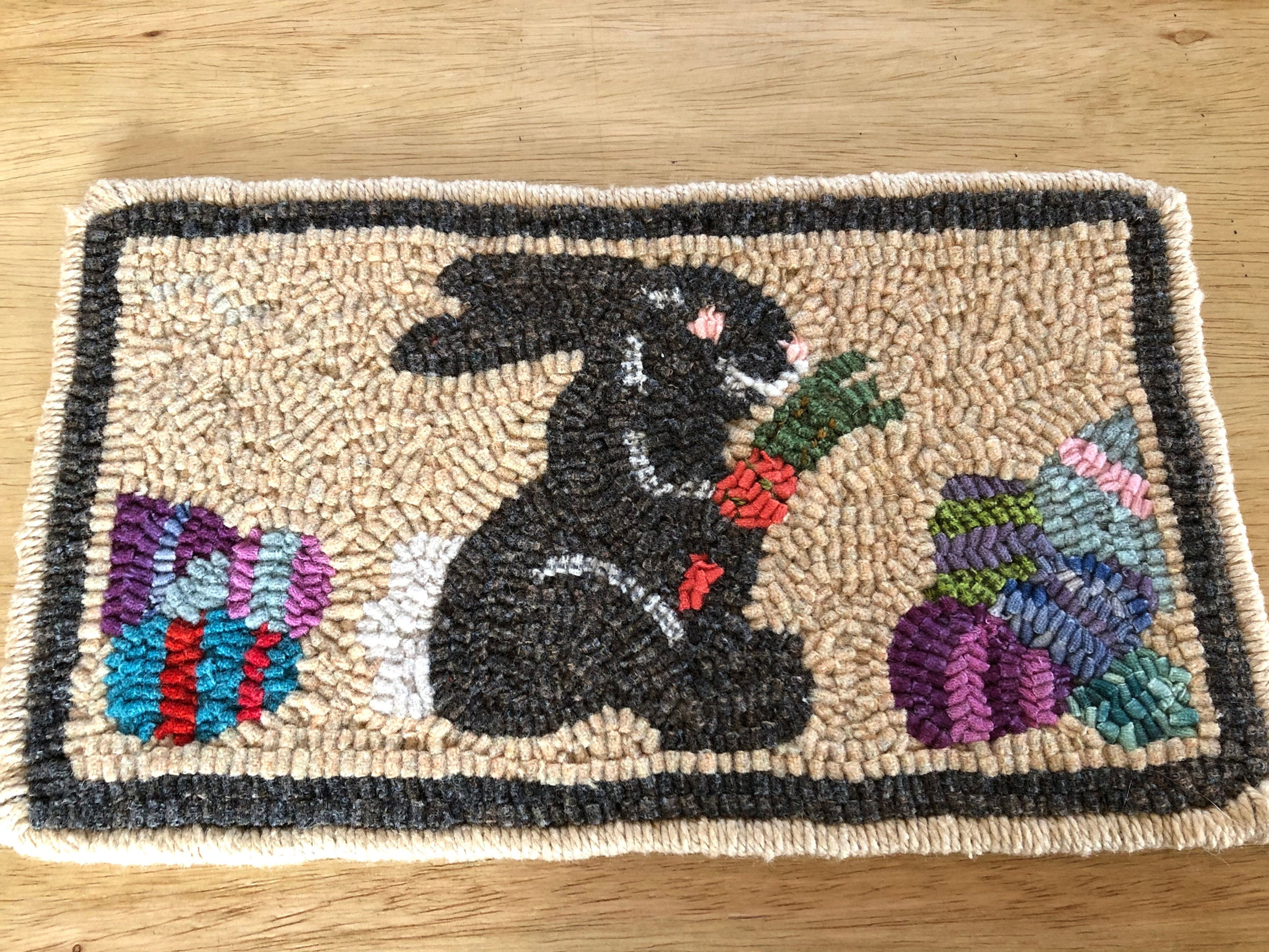 Brown bunny with carrot hooked rug