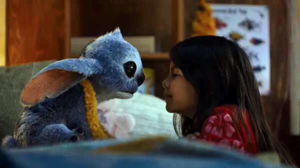 Maia Kealoha, right, as Lilo, with Stitch in “Lilo & Stitch.