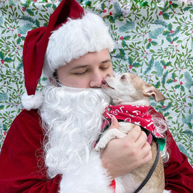 ZachMollyKissesSanta.jpeg