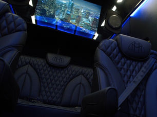 custom seats in a van conversion made by van sharks in hosuton texas.