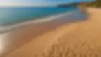Wide angle view of Marathakis Beach with golden sand and tranquil waters