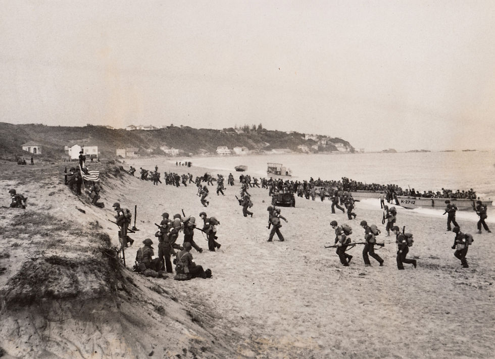 American troops landing on the beach in North Africa during Operation Torch, 1942. (Photo Courtesy of: Peter Deleuran).
