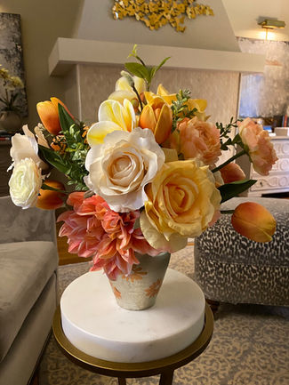 Home decor flowers in a beautiful custom vase.