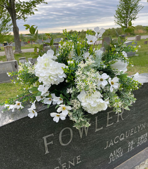 Classic white floral Memorial day headstone arrangement for a grave at Bluff Cemetery, Springdale, Arkansas.