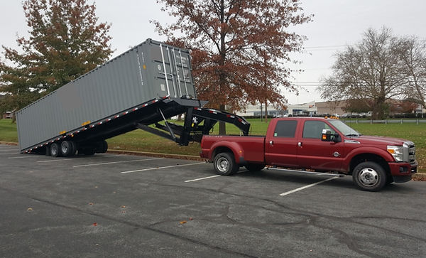 Our Truck and tilt trailer photo