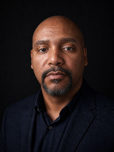 Headshot_with_trimmed_goatee_instead_of_full_beard_for_website_hero_section_edited.jpg