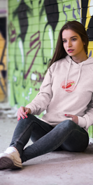 hoodie-mockup-featuring-a-woman-leaning-against-a-graffitied-wall-2797-el1.png