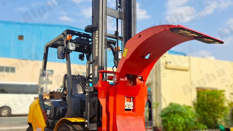 Close-up view of a forklift paper roll clamp gripping a large paper roll