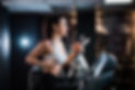young-sports-woman-with-ponytail-working-out-gym-running-treadmill-side-view.jpg