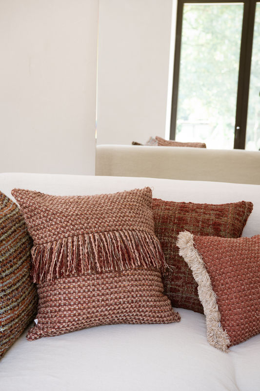 Cushions on a white sofa