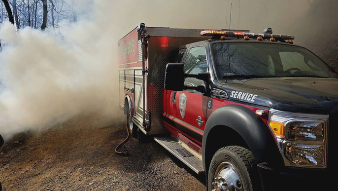 Wildfire in Clay County Threatens Home, One Firefighter Injured