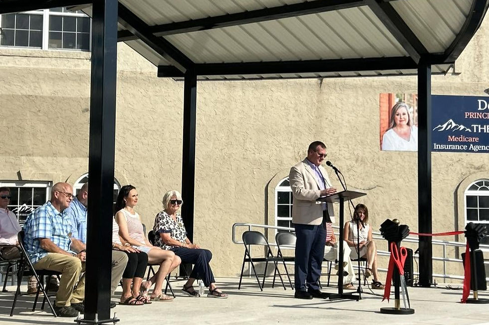 (Photo from the Downtown Murphy Facebook page) Mayor Tim Radford addresses the crowd at the dedication.