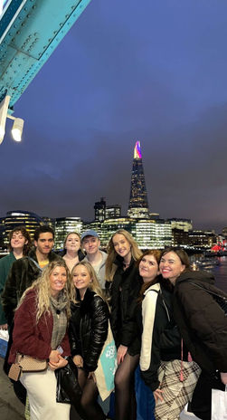 Harvey and friend posing in front of The Shard building closeup