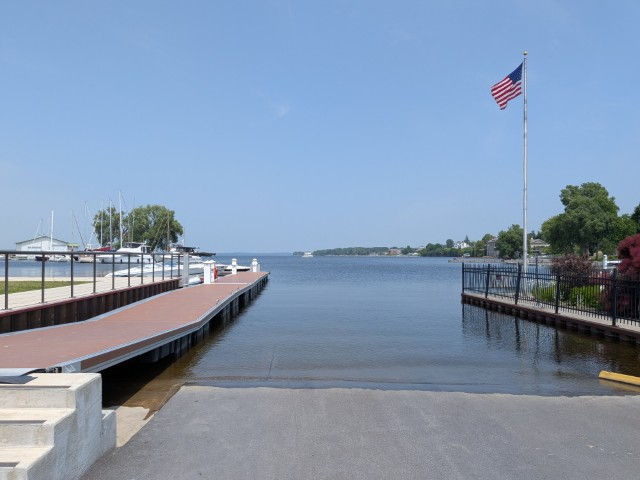 See the Boat. It's the tiny white speck on the horizon. See the Dock. It's not close to the boat. Dinghy motor stopped running at the end of the dock because the fuel feed from the tank is defective. . Rodney had to row back to the boat.