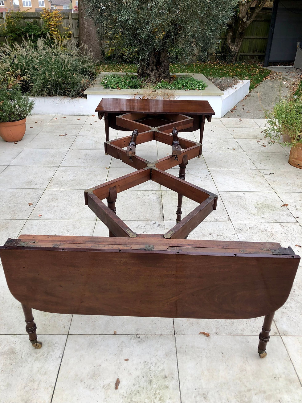 Thumbnail: Regency Mahogany Extending Dining Table by Wilkinson of Ludgate Hill, London. 