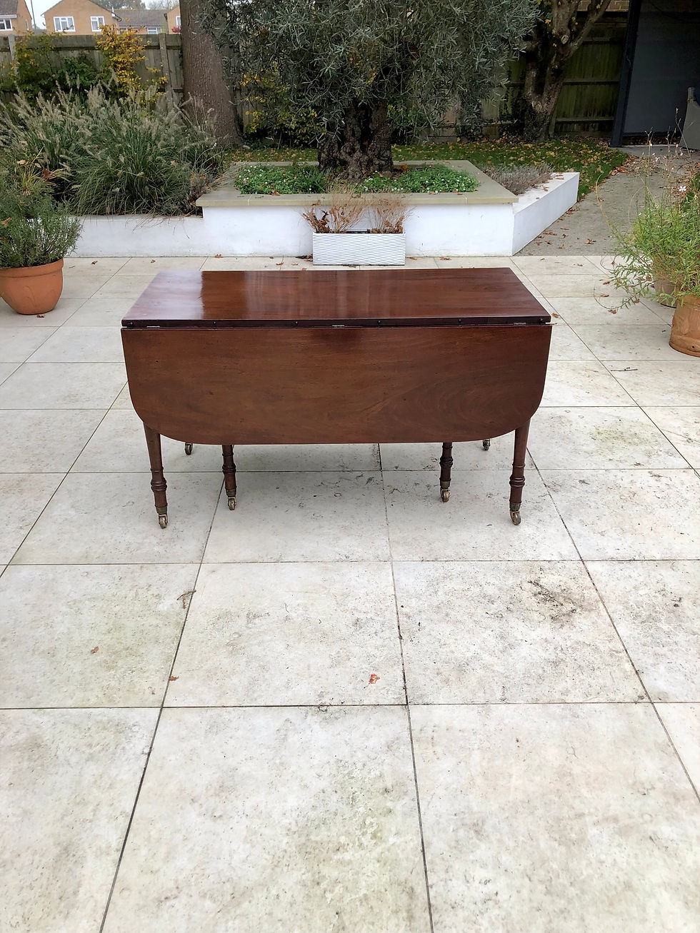 Thumbnail: Regency Mahogany Extending Dining Table by Wilkinson of Ludgate Hill, London. 