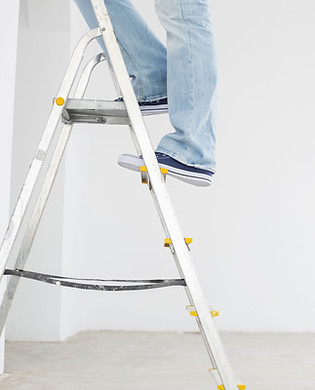step ladder with man with a person on them