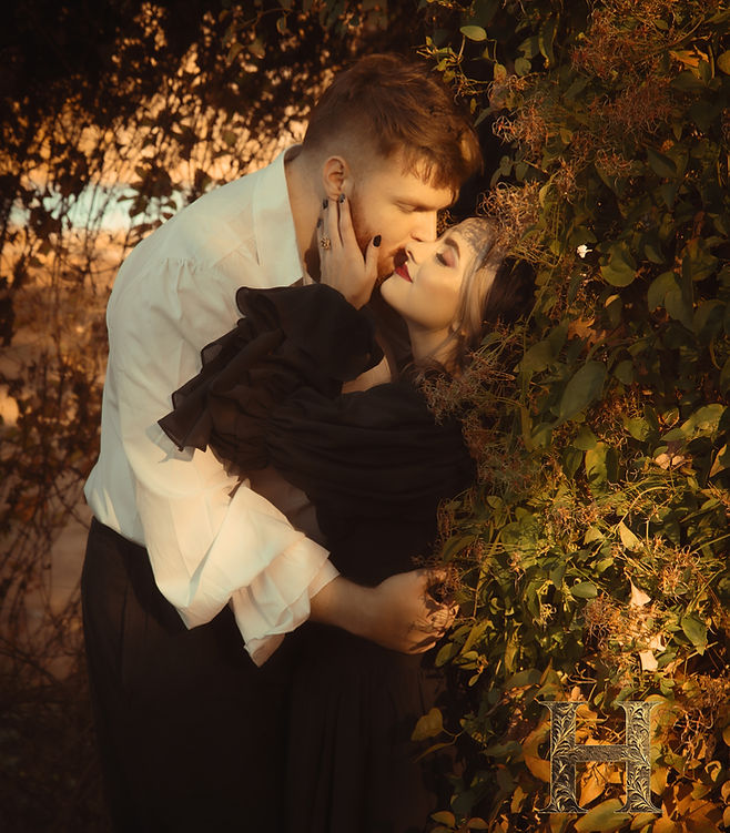 a moody stylish romantic couple in fall fairy garden We recently had the pleasure of an amazing day with an adorable couple at the Fabyan Garden in Geneva, IL. Over the years i have become known as that "Gothic wedding photgrapher" and this was certainly a moody stylish bride to be who had my heart. 

     "Lindsay is amazing! She did such a good job with our engagement photos. She was great at posing us and the pictures couldn’t have turned out better."