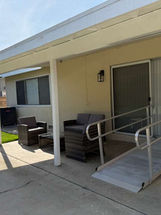 Exterior patio with ramp and seating area, Melvin Heart Haven