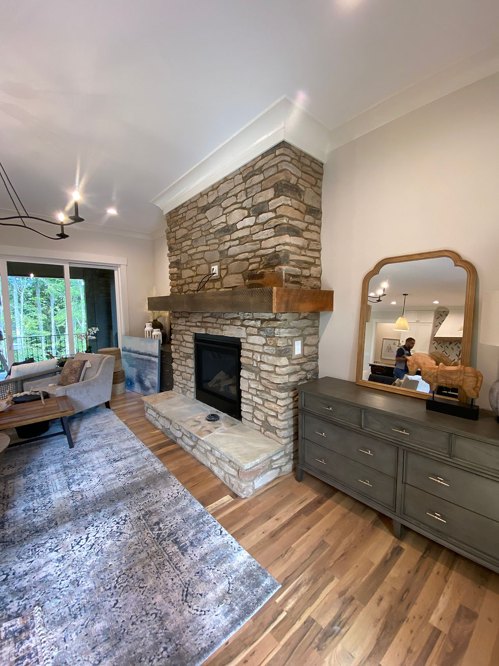 a stone fireplace with stone hearth