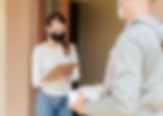 close-up-delivery-man-wearing-mask.jpg