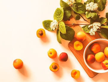 bunch of brown fruits near flowers_edite