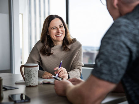 Crystal headshot wearing a neutral sweater