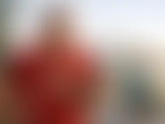 Man jogging in red shirt holds chest with concern, city skyline in background. Woman runs ahead. Heartbeat graphic overlay, morning light.