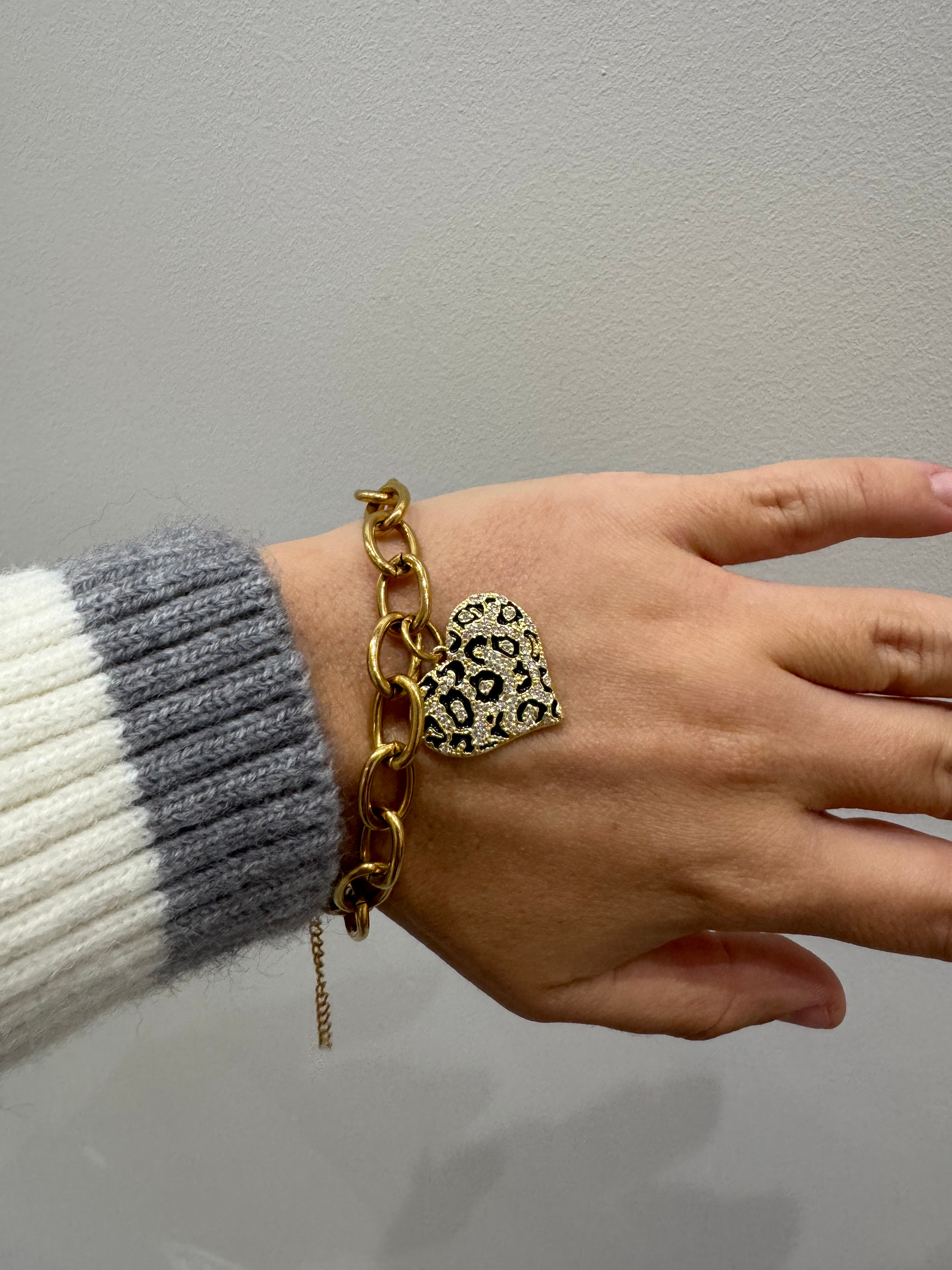 Bracelet doré en acier inoxydable avec une breloque léopard noir avec des brillants blancs en plaqué or 18k